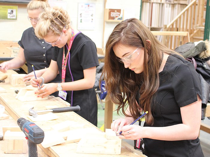 Hair & Beauty students put together their bird boxes 